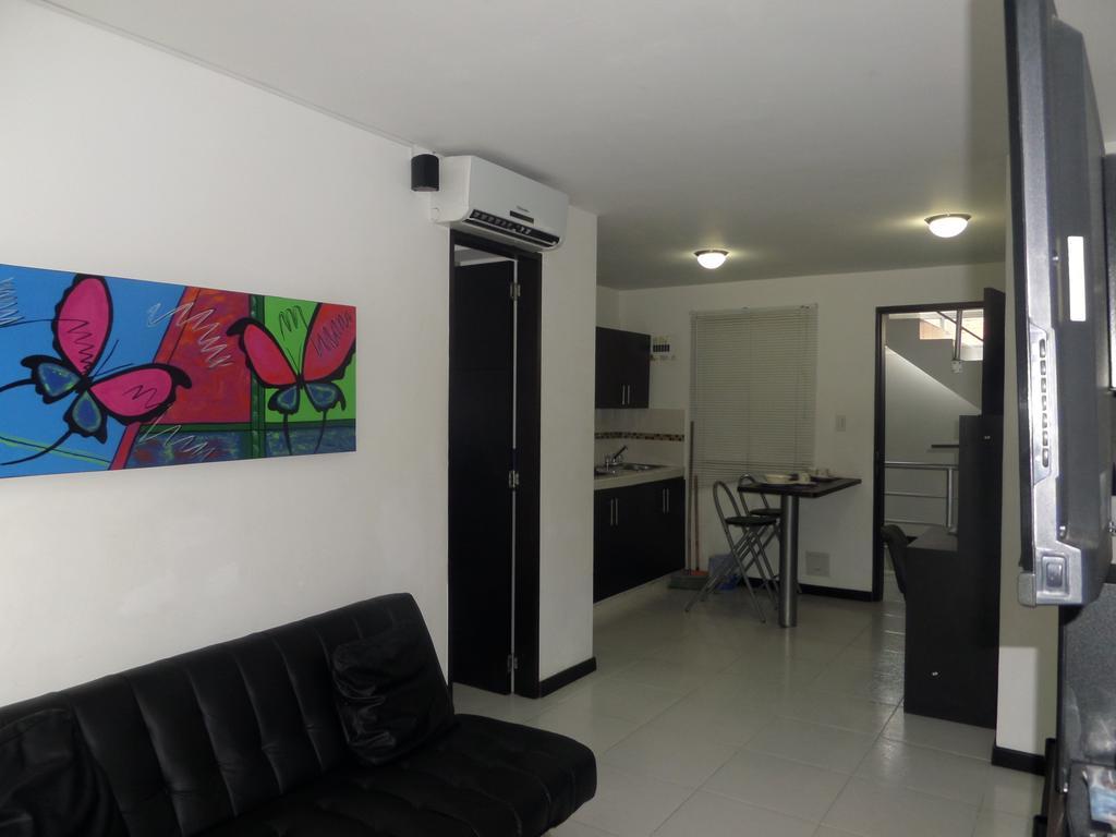 Apartasuites San Marcos Cali Habitación foto