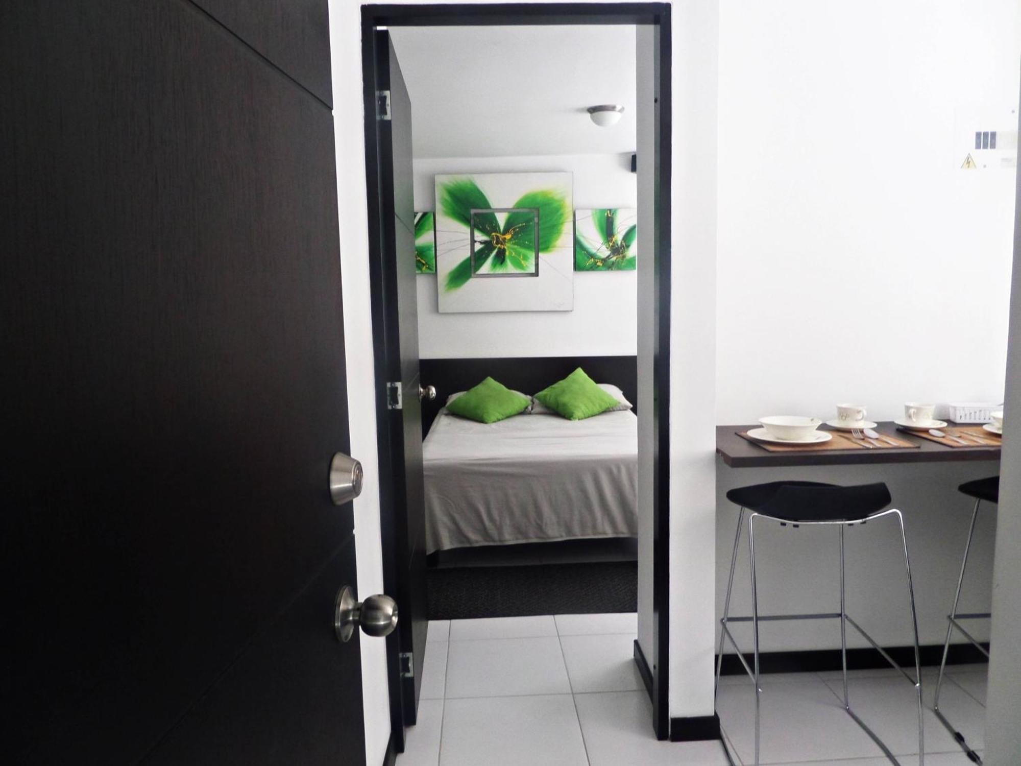 Apartasuites San Marcos Cali Habitación foto