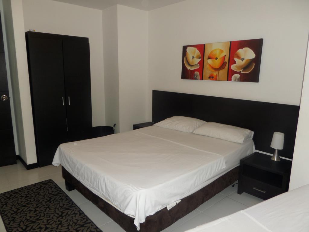Apartasuites San Marcos Cali Habitación foto