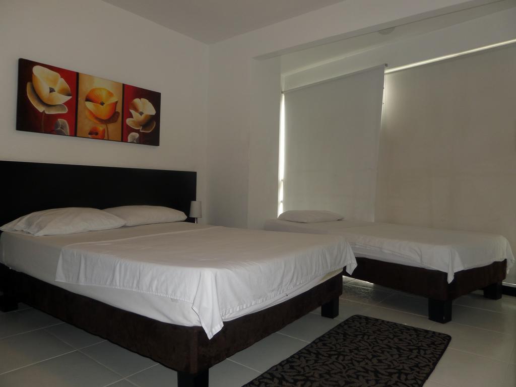 Apartasuites San Marcos Cali Habitación foto