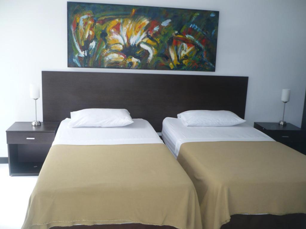 Apartasuites San Marcos Cali Habitación foto